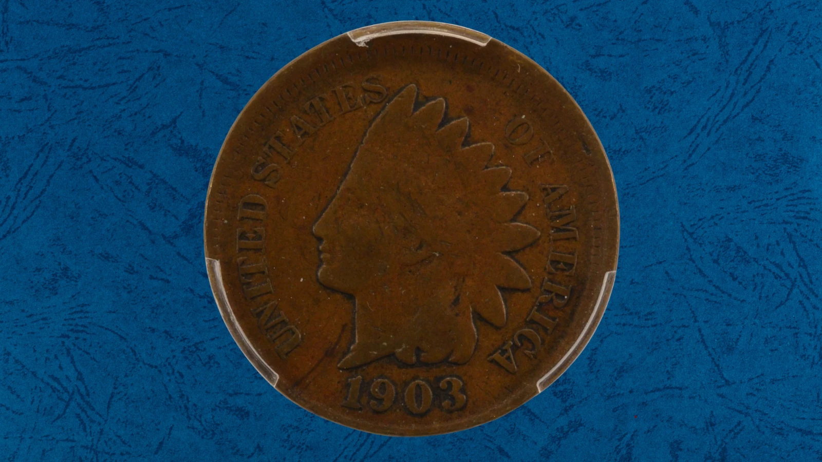 1903 Indian Head Penny broadstrike error showing coin struck outside the collar, resulting in wider diameter and spread design
